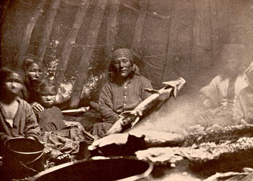 Cooking a Fish in an Innu Lodge Cooking a Fish in an Innu Lodge
